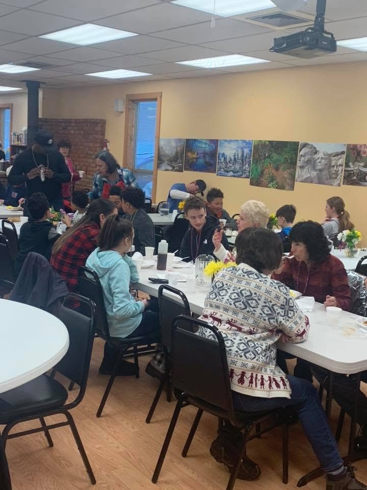 Community members gathering together at the McCall Senior & Community Center