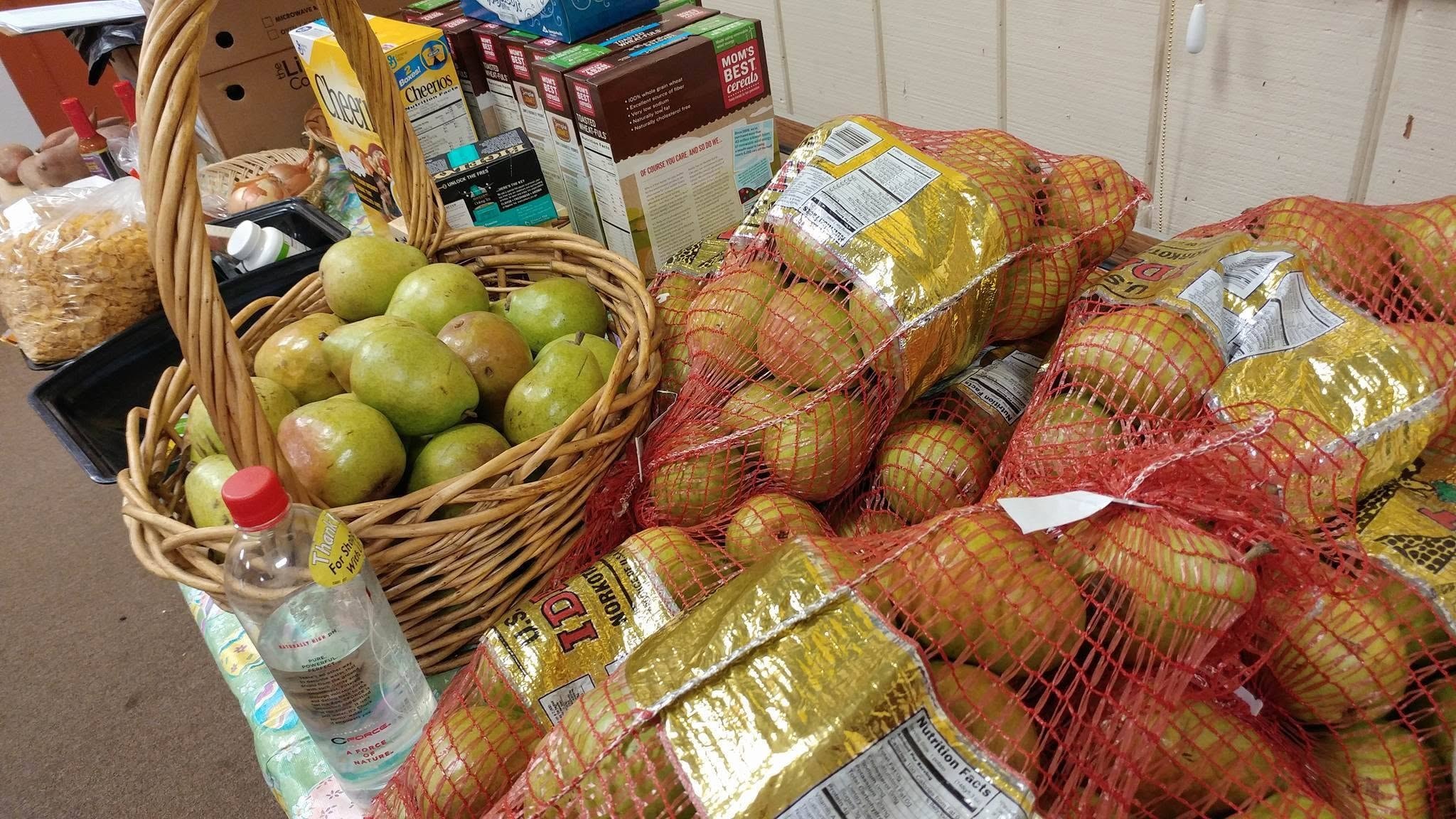Community volunteers at the McCall food pantry helping neighbors with fresh produce and groceries